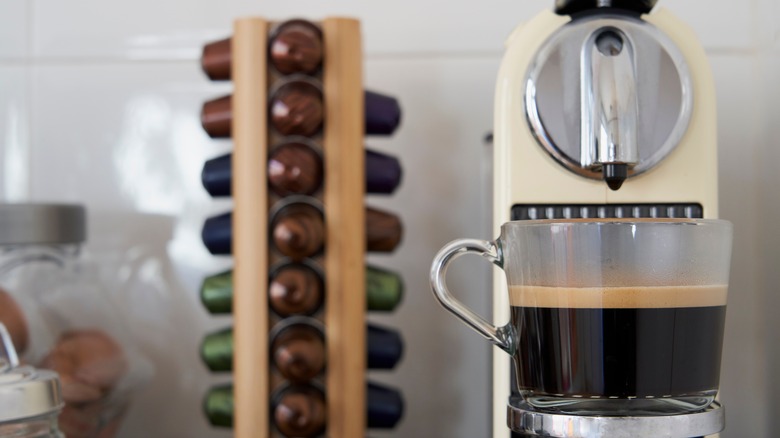 A nespresso machine with coffee