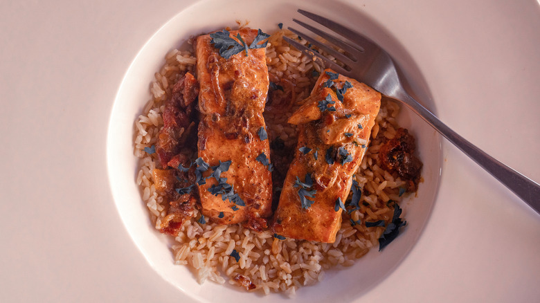 bowl of salmon and brown rice