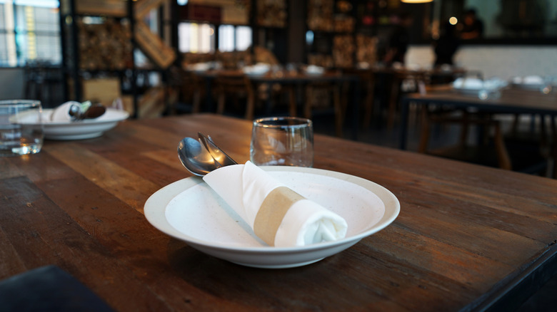 Emoty place-setting in a steakhouse