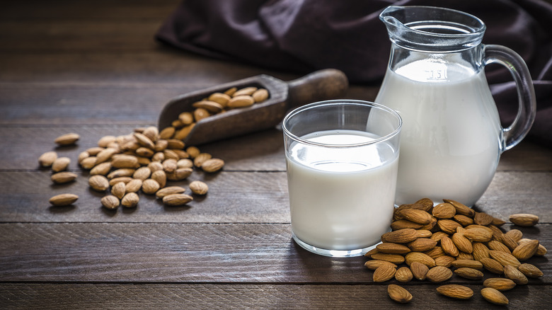 Almonds and glass of almond milk