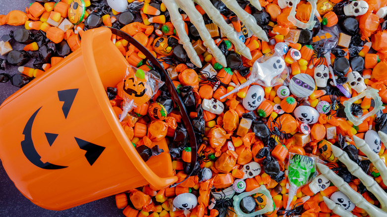 Halloween pumpkin pail and candy