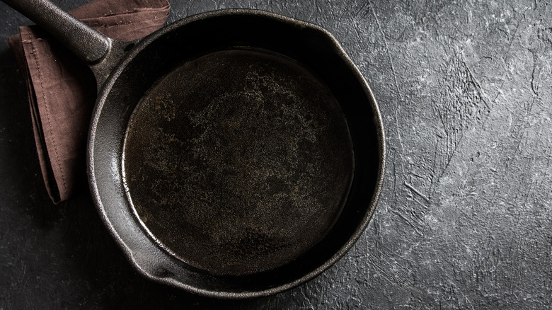 A cast iron pan on a grey table