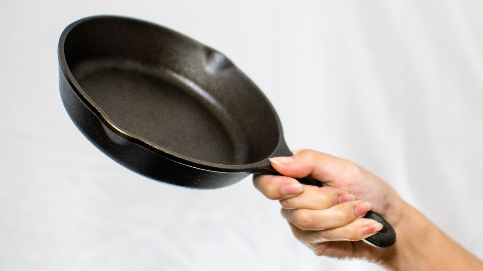 The Old-School Cast Iron Seasoning Method That Doesn't Actually Work - Tasting Table