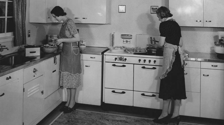 2 women in a 1940s kitchen