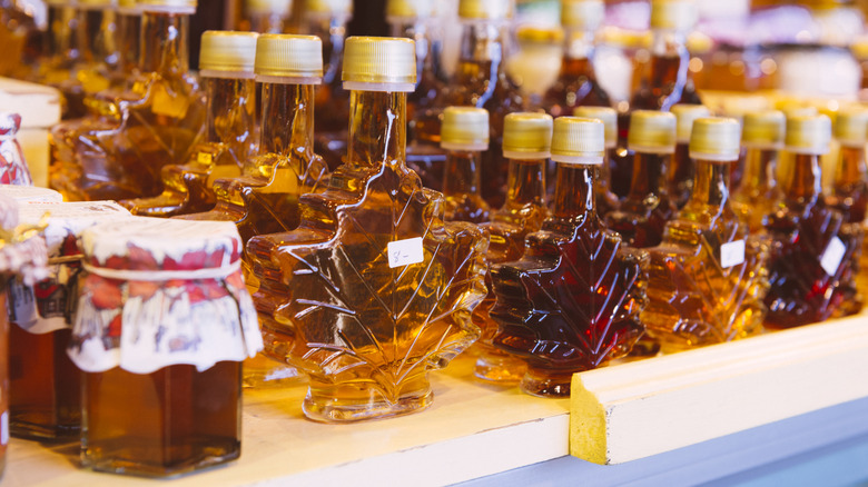 row of maple syrup in store