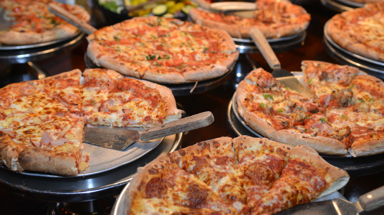 A pizza buffet with different topping options