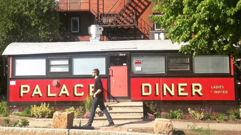 Palace Diner train car with man walking in front of it