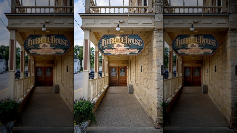 Entrance to Hubbell House with lit sign