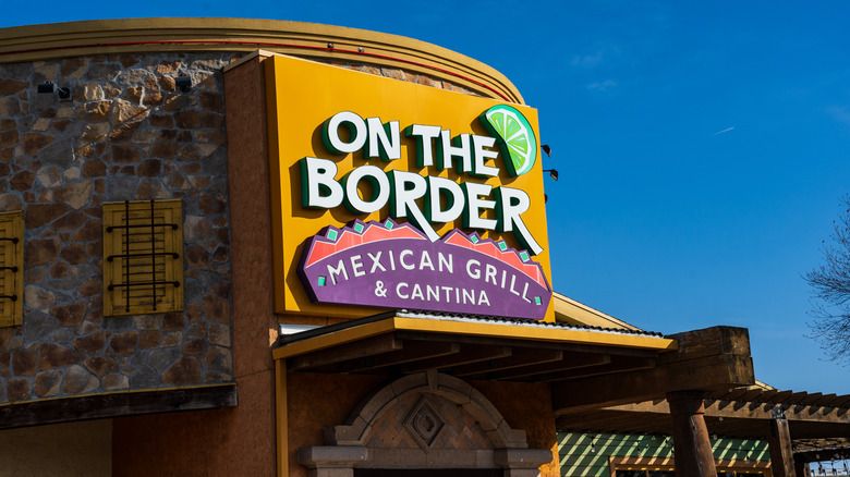 Outside of an On the Border Mexican Grill & Cantina restaurant against a blue sky