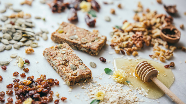 homemade protein granola bars with nuts, dried fruit, and honey