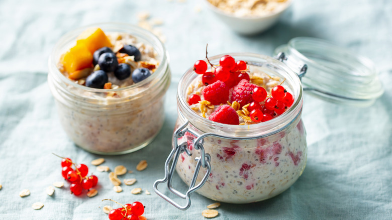 Containers of overnight oats with berries