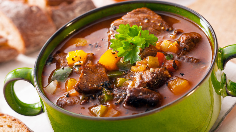 Mulligan stew in a green stockpot
