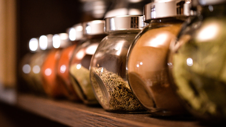 Spice rack with round jars