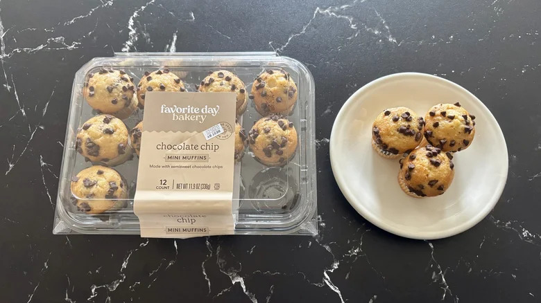Mini chocolate chip muffins on a plate with packaging