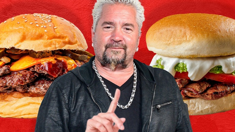 Guy Fieri pointing to burger