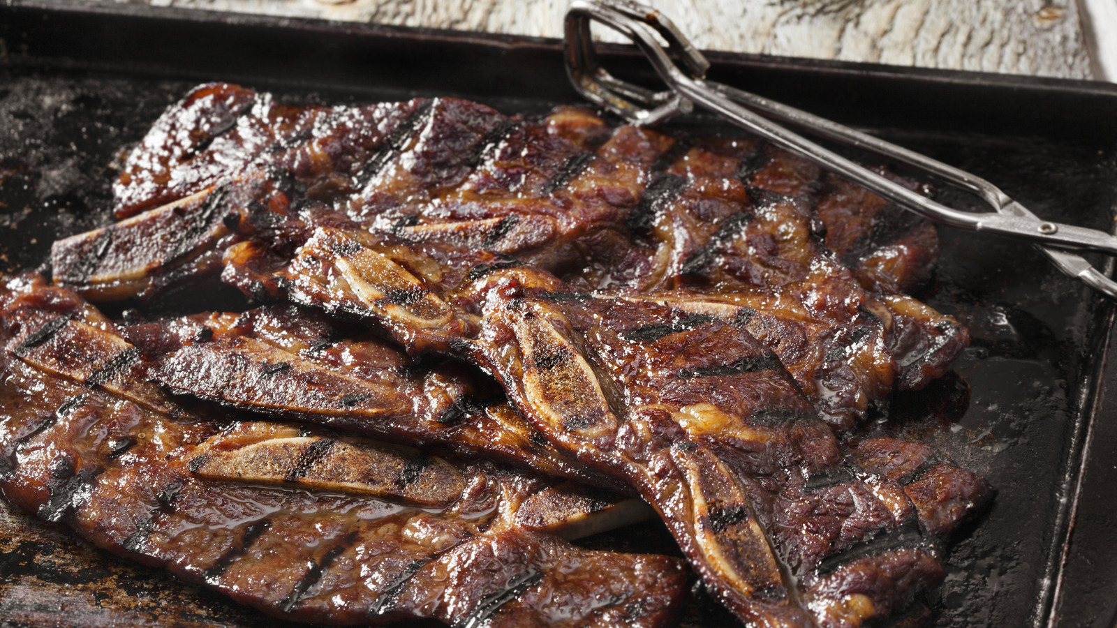 The Only 2 Ingredients Slow-Cooker Ribs Need For Rich Sticky-Sweet Flavor - Tasting Table