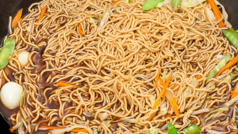 Filipino miki noodle dish