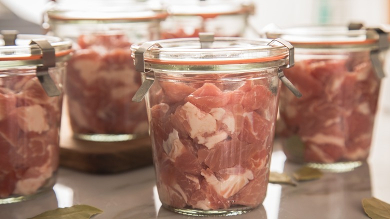 Canned meat in glass jars
