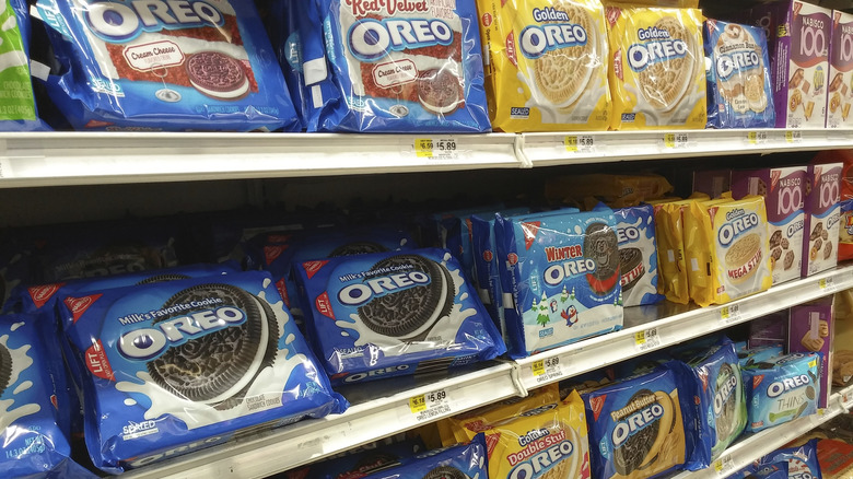 Oreo packages on shelves in a grocery store