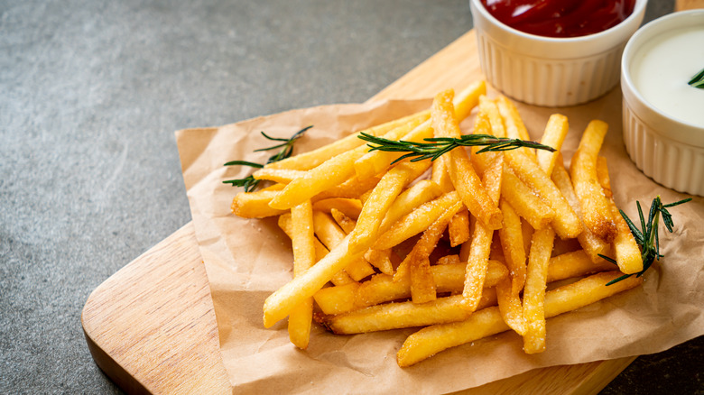 french fries on parchment paper