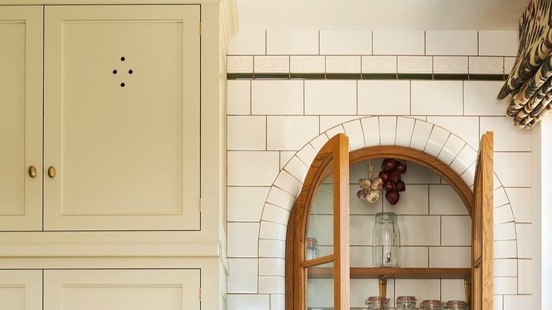 vintage cabinets with cut-out pattern