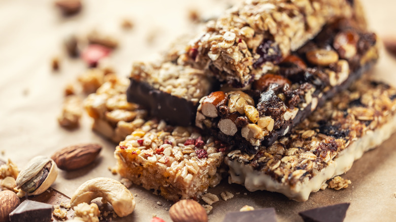 A stack of various types of granola bars