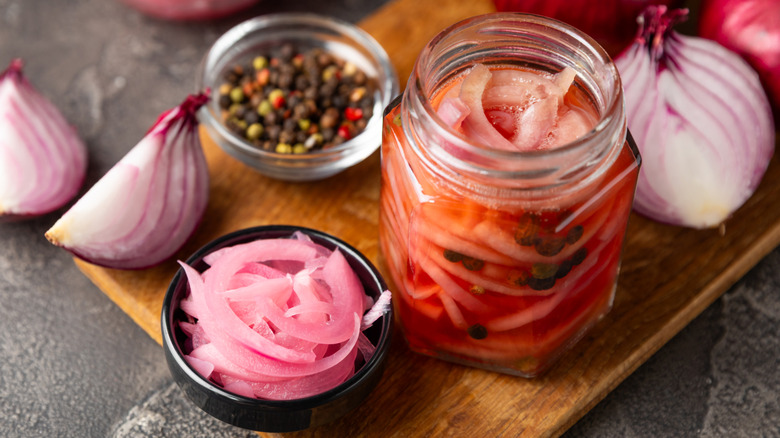 Pickled red onions in a glass jar