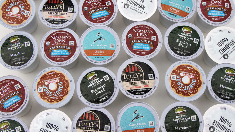 single serving coffee pods laid out on a white surface