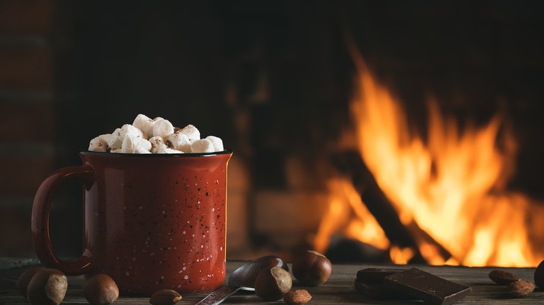 hot chocolate near fireplace