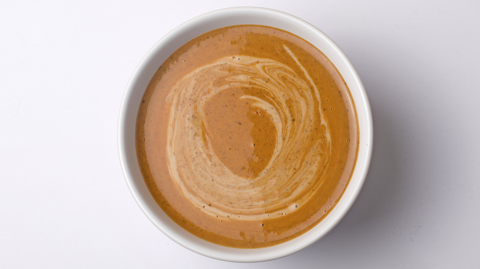 The Pantry Staple For A Smoother Peanut Butter Dessert Sauce