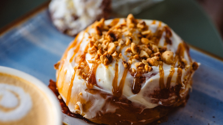 cinnamon rolls with crushed peanut on top