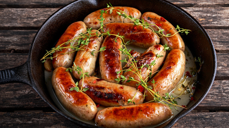 Brats in a cast iron skillet