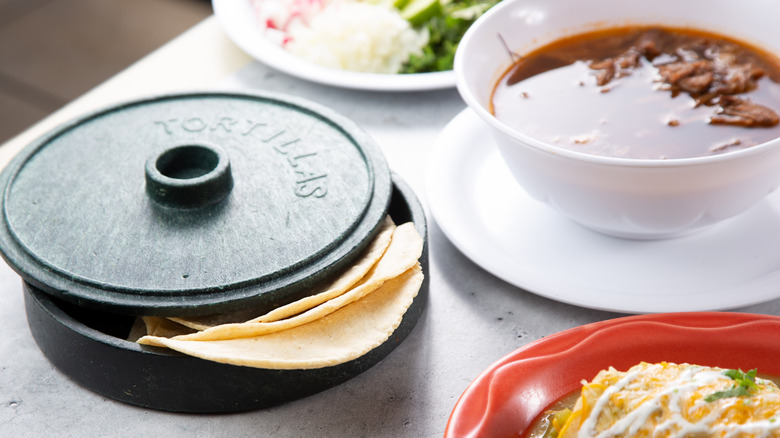 tortilla warmer on table with Mexican food
