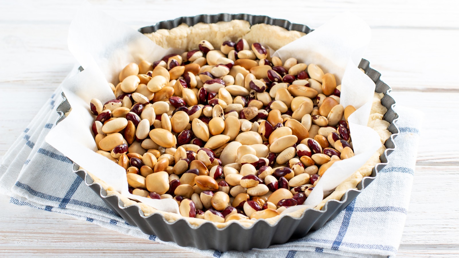 The Pie Weight Mistake That's Causing Your Crust To Slump