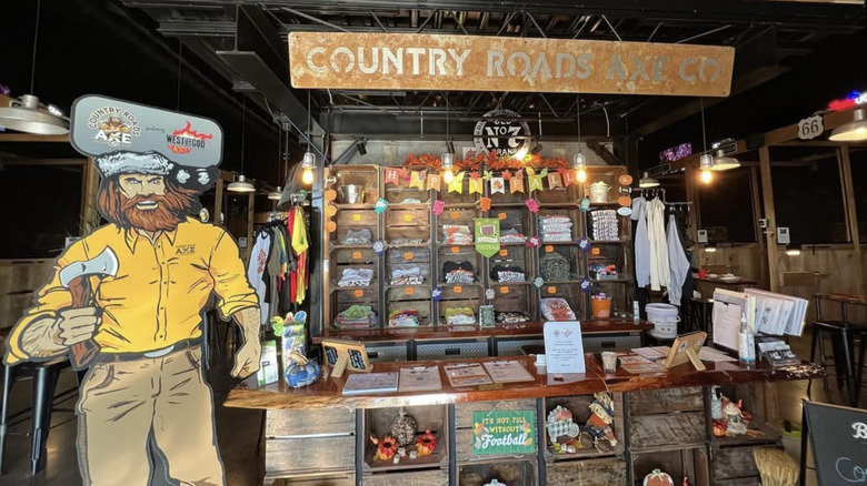 Display at Country Roads Axe Co with cardboard axeman