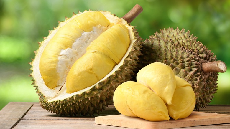 whole and cut durian fruit