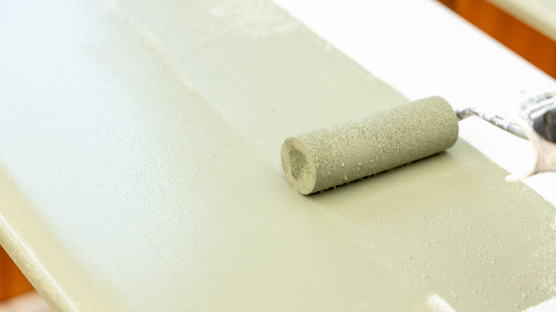 Home cook painting kitchen cabinets sage green