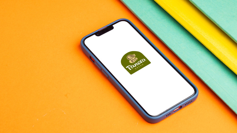 Phone displaying Panera bread logo