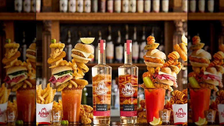 Arby's two vodka bottles with bloody marys, burgers, fries