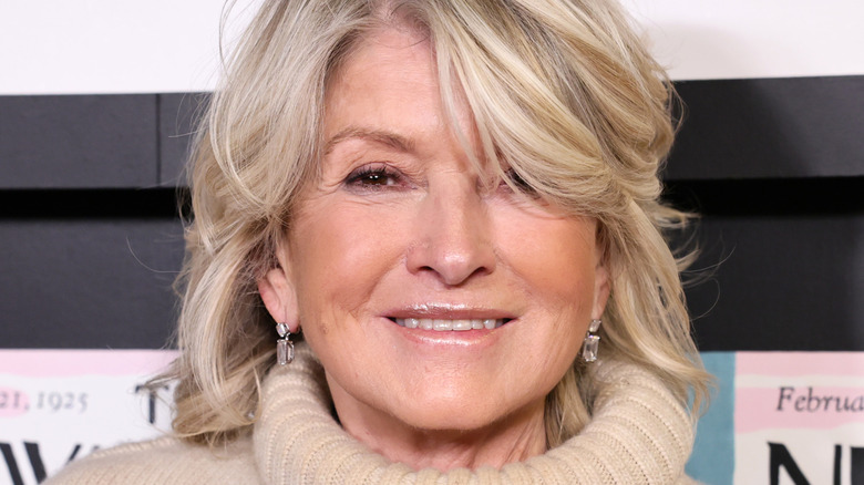 Martha Stewart with hair swooping over face
