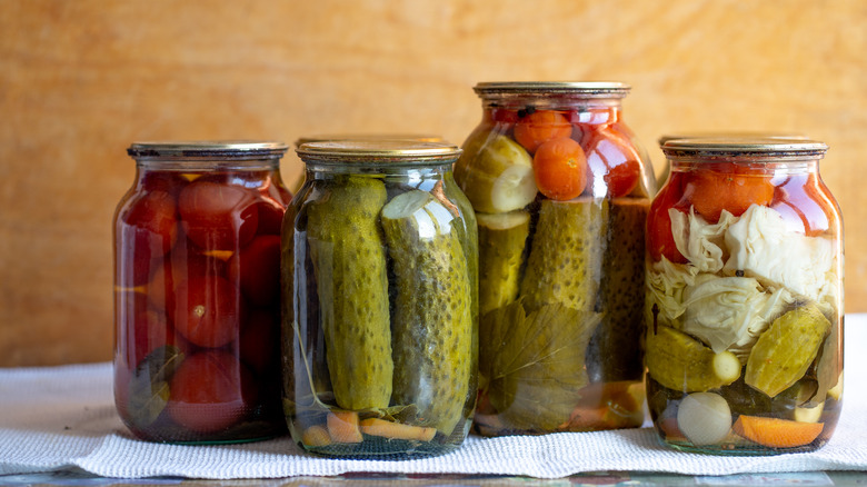 glass jars with pickled produce