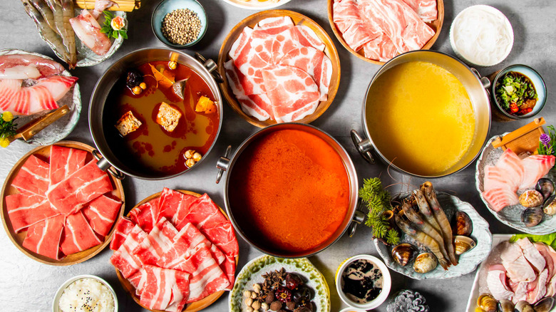 A full table of hot pot and its ingredients