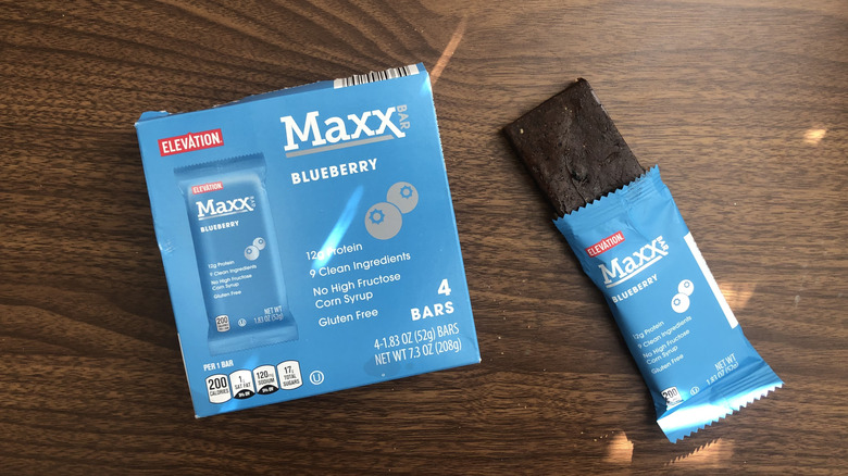 Aldi's Elevation MAXX Blueberry Bar opened next to a box