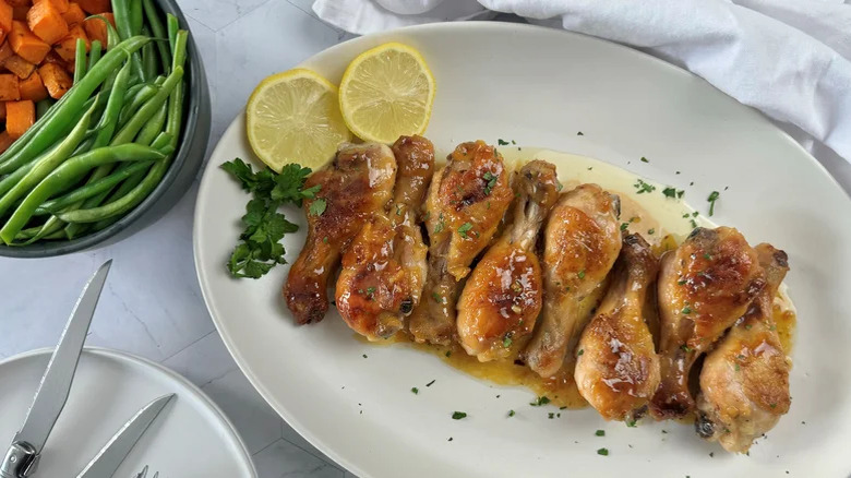 Chicken drumsticks with vegetables