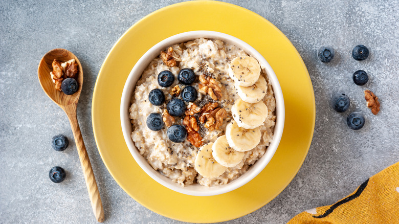Bowl of oatmeal with fruit and nuts