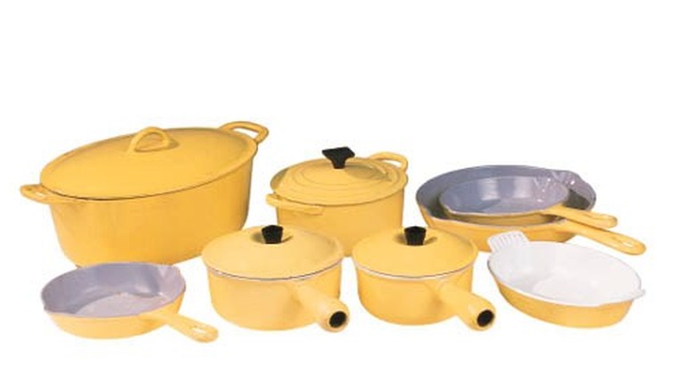 The 12-piece Elysée Yellow set Marilyn Monroe owned on display against a white background