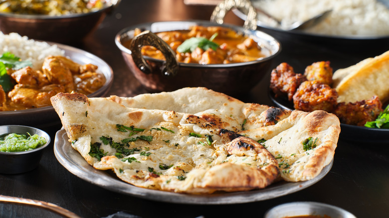 Naan surrounded by food