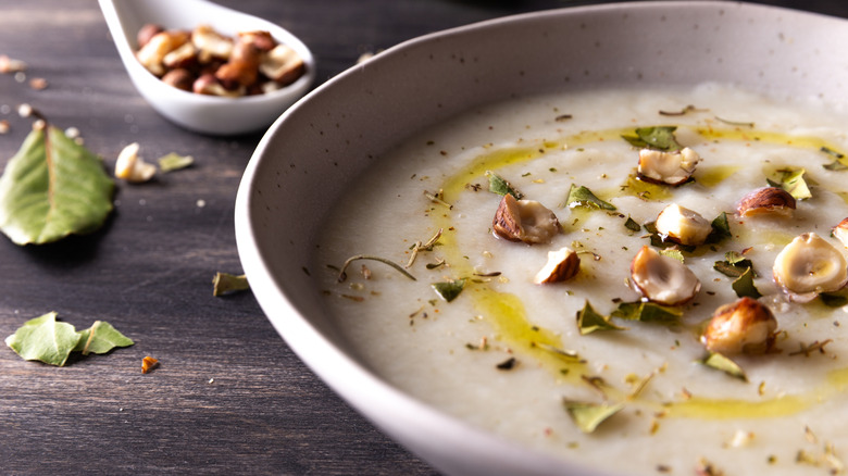 Hazelnut soup in a white bowl