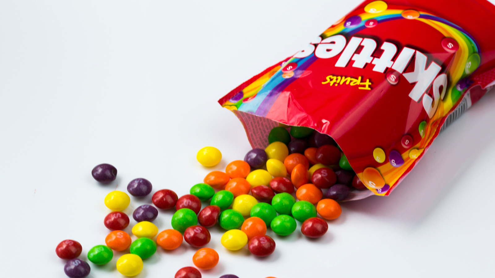 The Real Reason Purple Skittles Taste Different In The Uk 