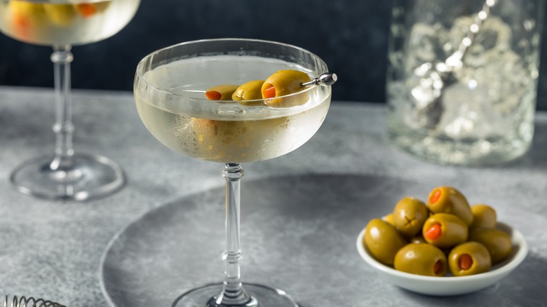 cold dirty martini with olives